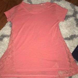 a coral shirt